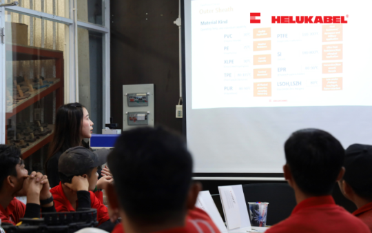 Ms. Le Thi Linh Chi - Sales Engineer of HELUKABEL Vietnam presented about the control and signal cables for production automation.