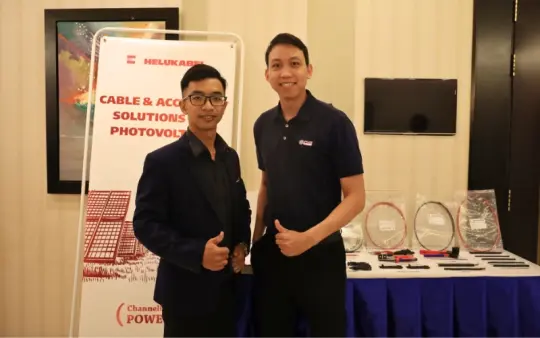 Mr. Nguyen Trung Tuan, on the right, a participant at the event.
